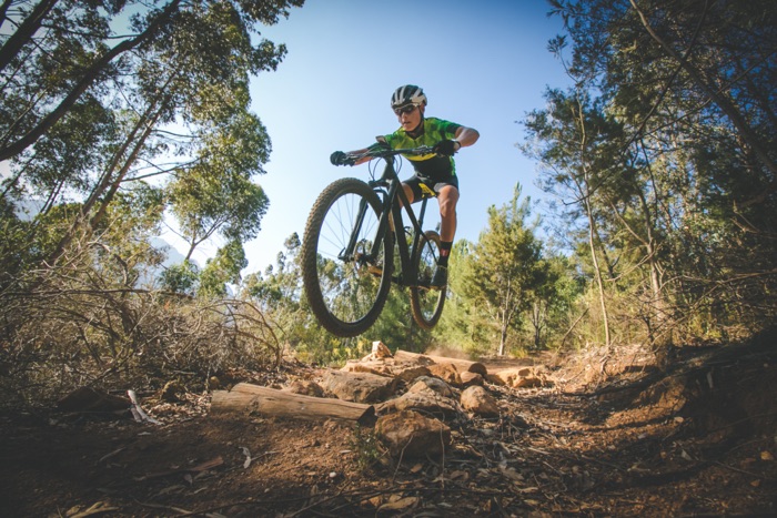 MTB downhill biker with mountain bike goggles during a sporting competition